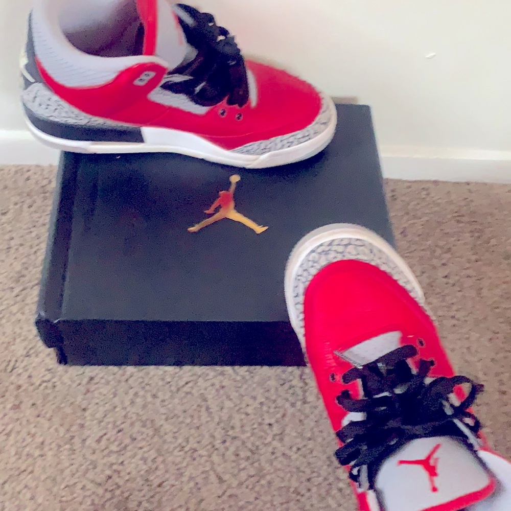 Red , black and white Jordan 3s